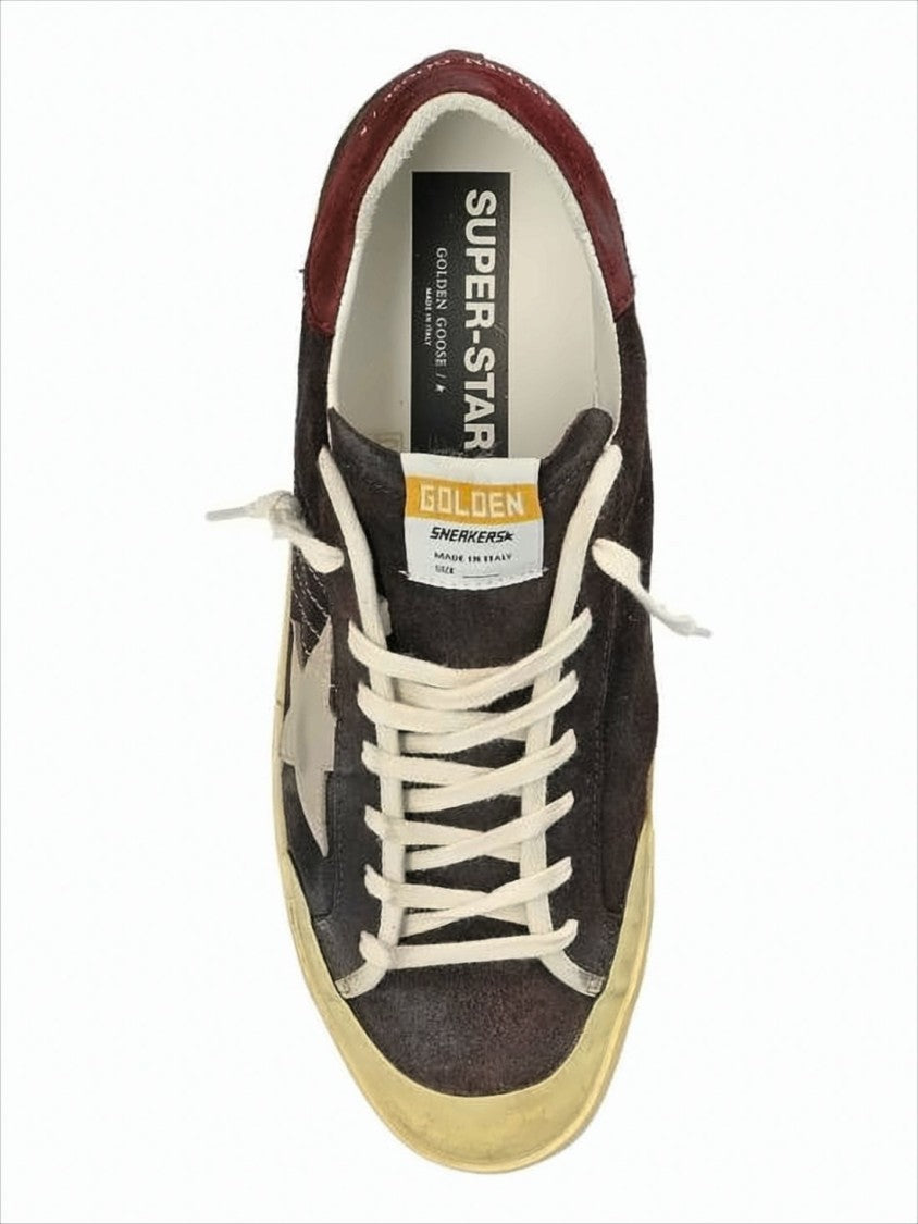Golden Goose Distressed Black Suede Low-Top Sneakers With Contrasting Star Emblem