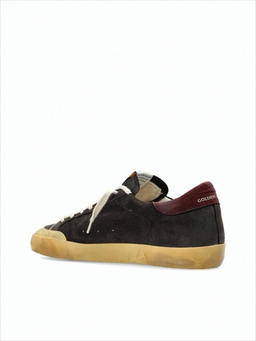 Golden Goose Distressed Black Suede Low-Top Sneakers With Contrasting Star Emblem
