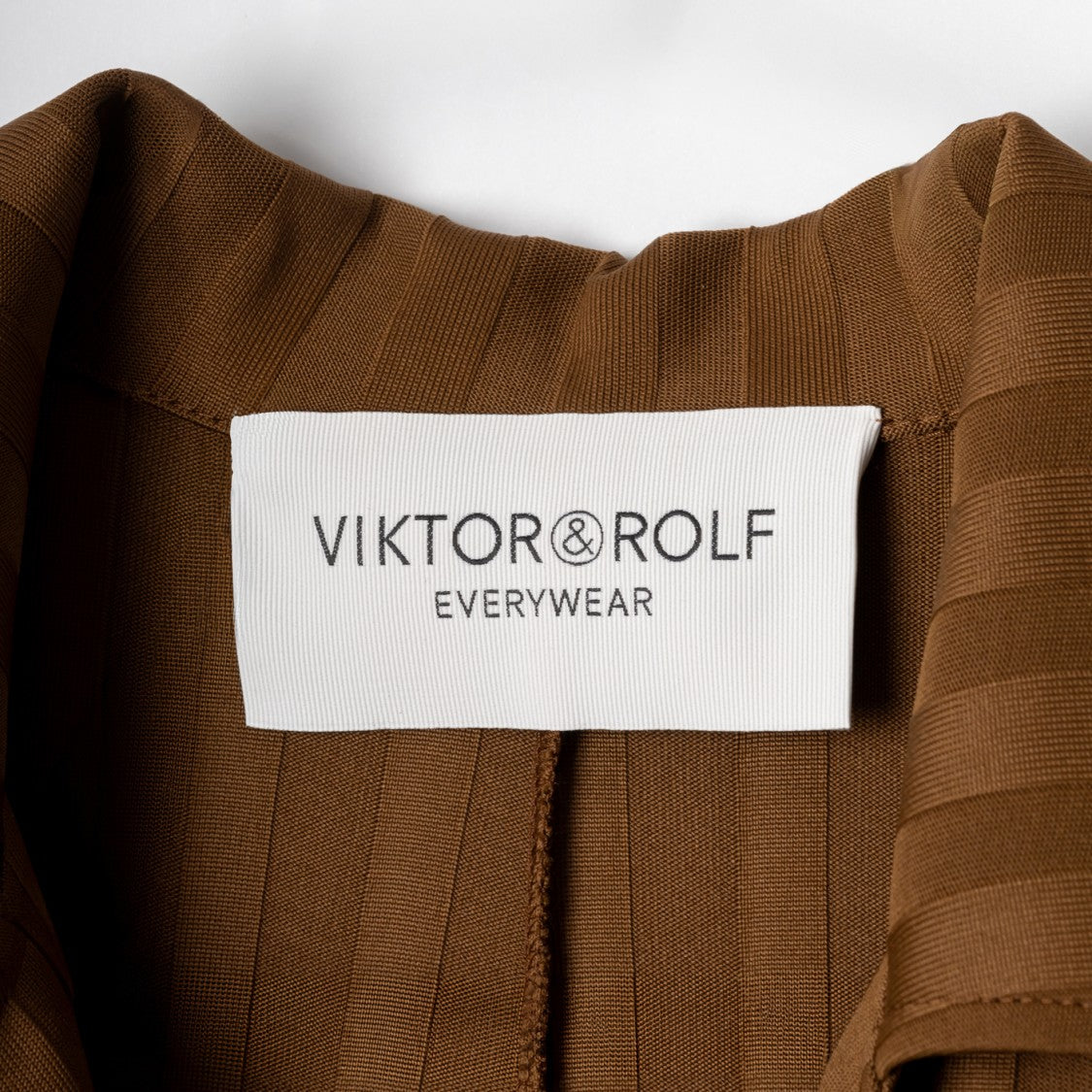 Viktor & Rolf Ribbed Jumpsuit With Notched Collar And Belted Waist
