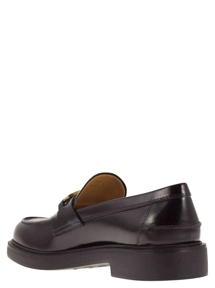 Tod's Calfskin Leather Moccasins With Metal Logo Mask