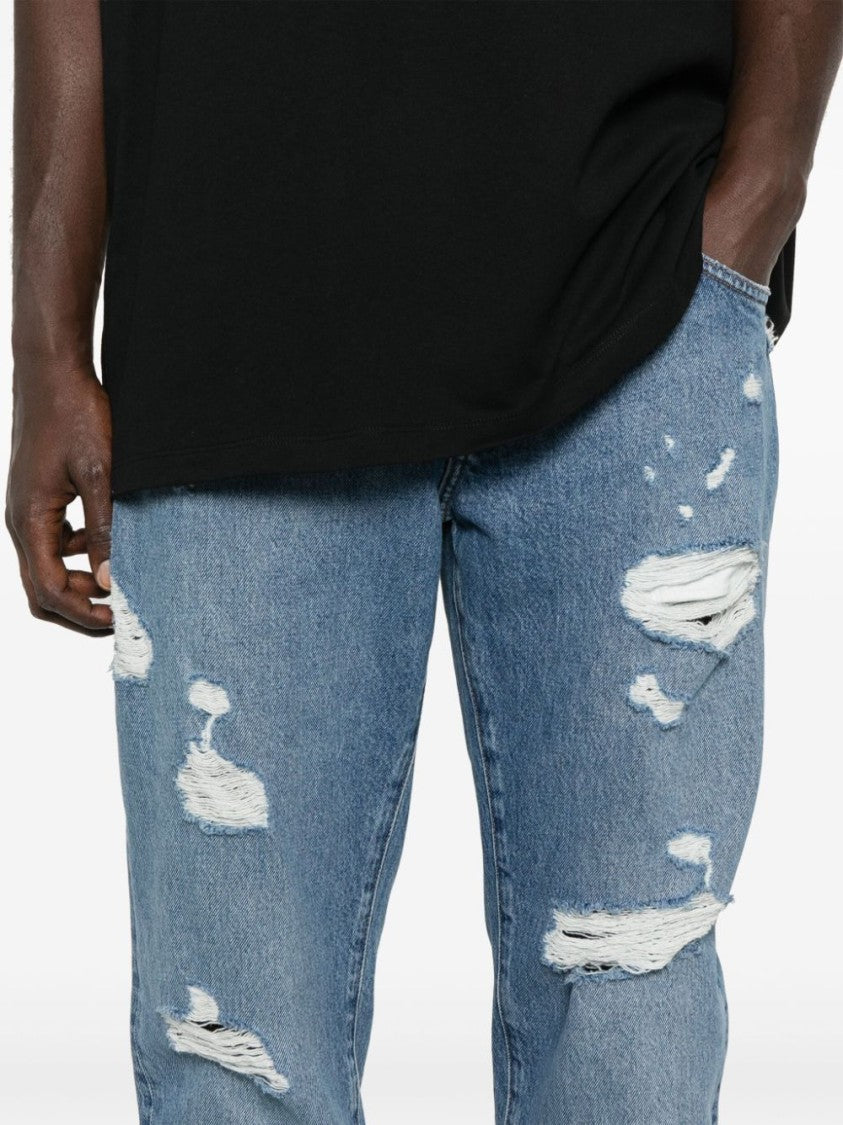 Dolce & Gabbana Relaxed Fit Distressed Denim Trousers With Classic Five-Pocket Design