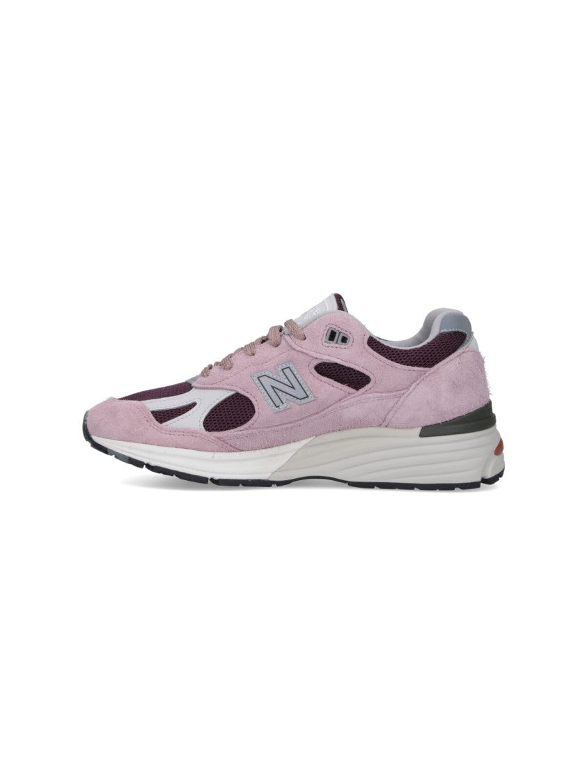 New Balance Suede And Mesh Sneakers With Iconic Branding And Textured Accents