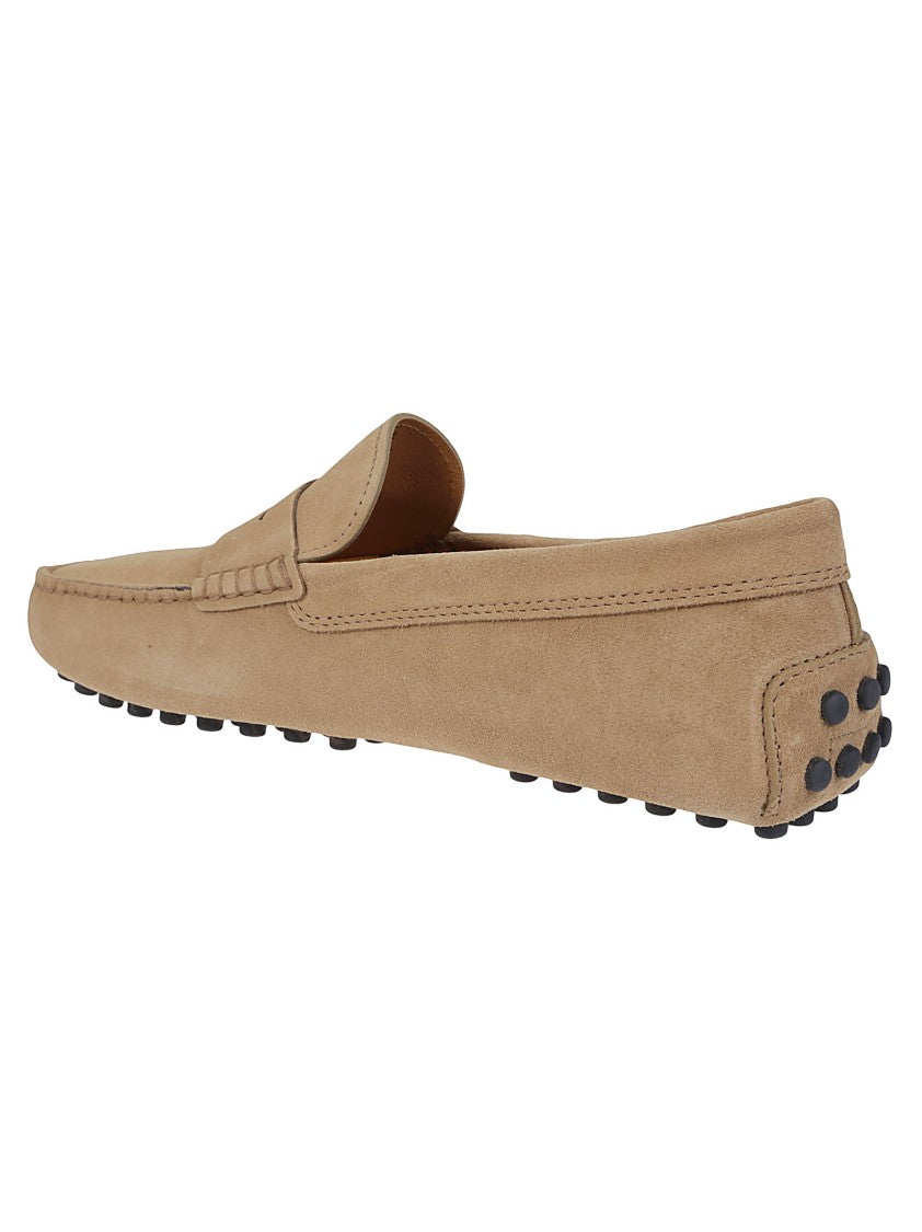Tod's Moccasin-Inspired Leather Loafers With Rubber Pebble Sole