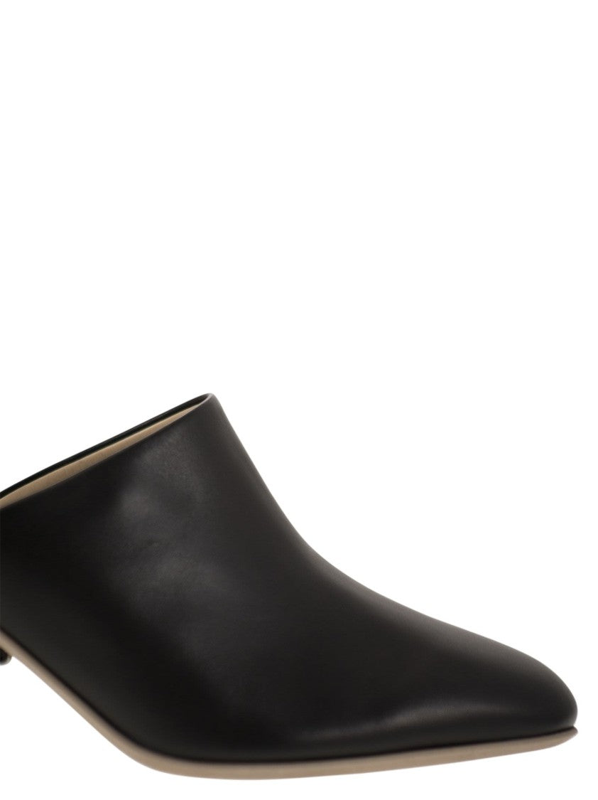 Tod's Refined Black Leather Sabot With Contrasting Details