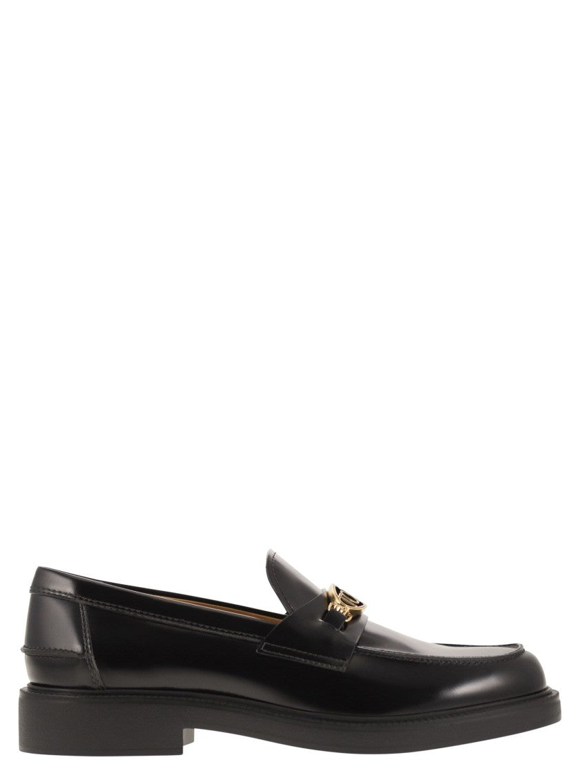 Tod's Calfskin Leather Moccasins With Metal Logo Mask