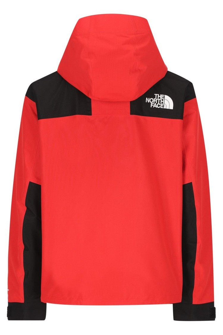 The North Face Classic Red Jacket With High Collar And Practical Fit