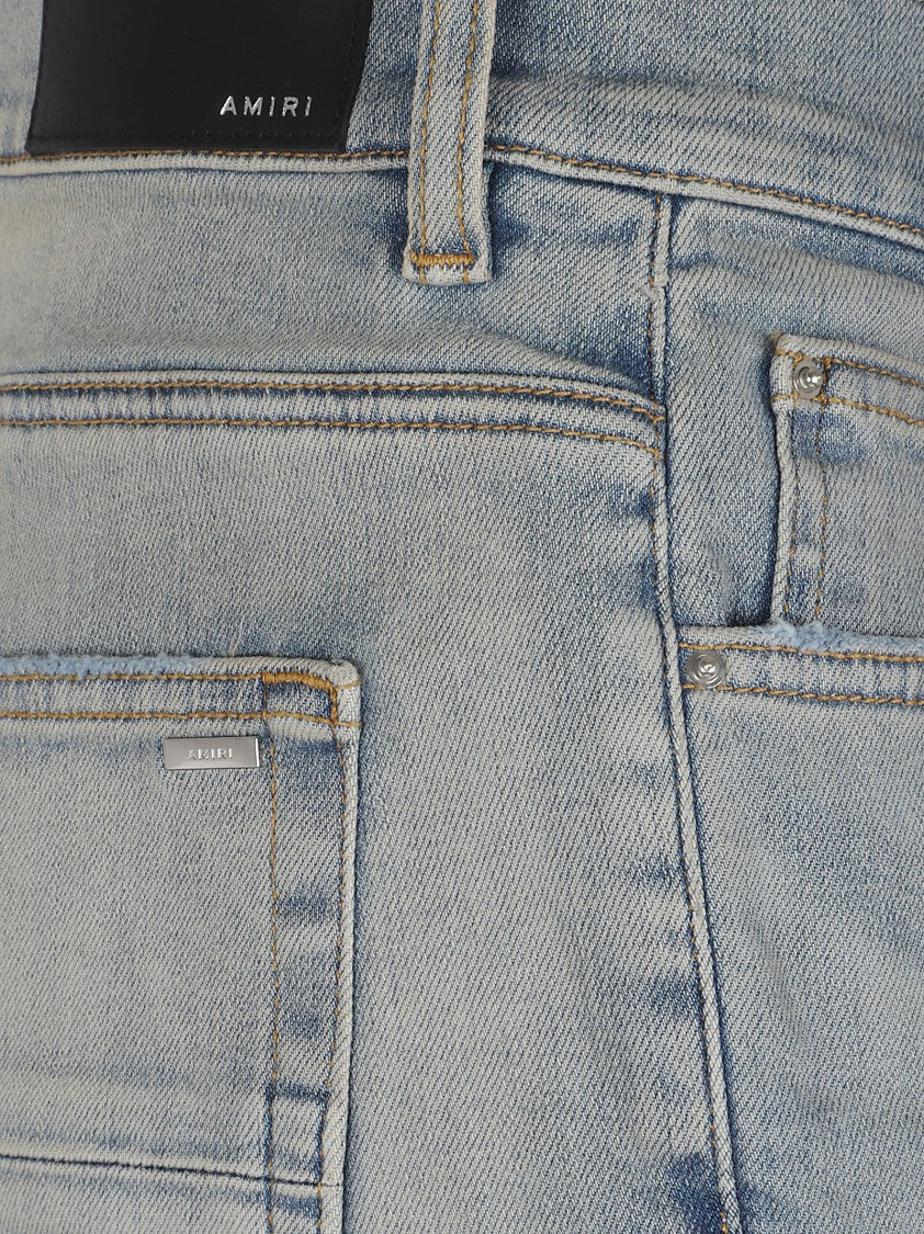 Amiri Light Faded Distressed Skinny Jeans