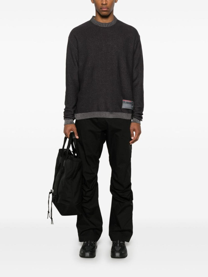 Gr10k Adjustable Black Pants With Concealed Fastenings And Zip Details