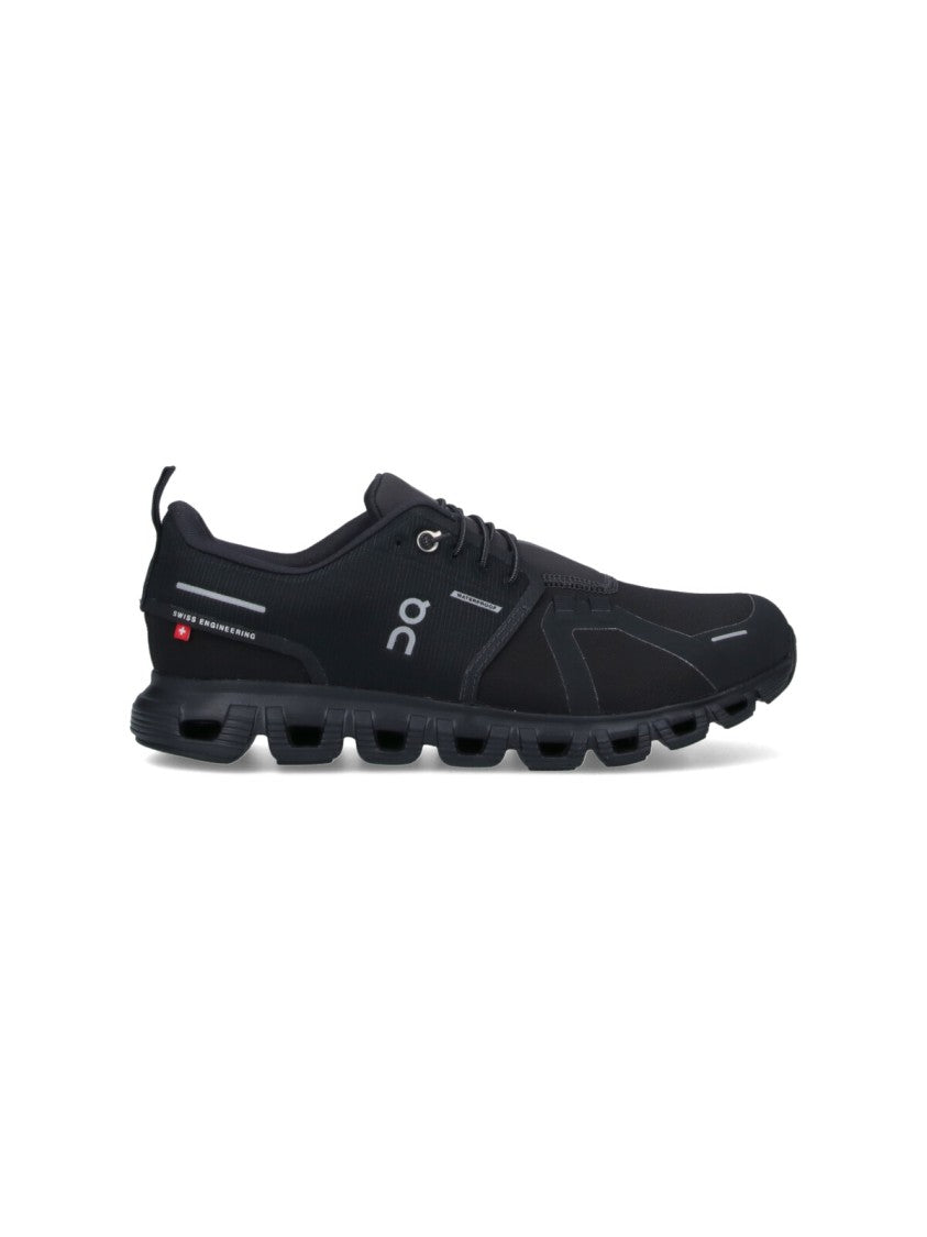 On Low-Profile Sneakers With Segmented Sole And Reflective Accents