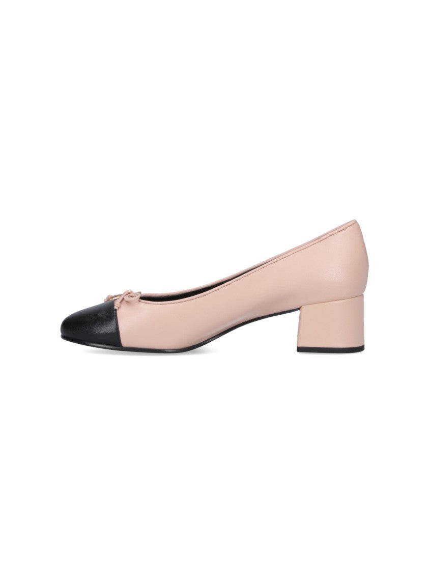 Tory Burch Pink Hammered Leather Bow Pumps