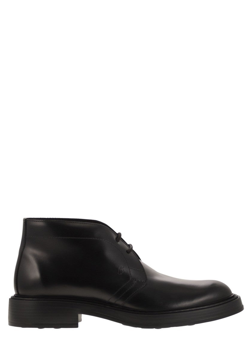 Tod's Calfskin Ankle Boots With Embossed Monogram