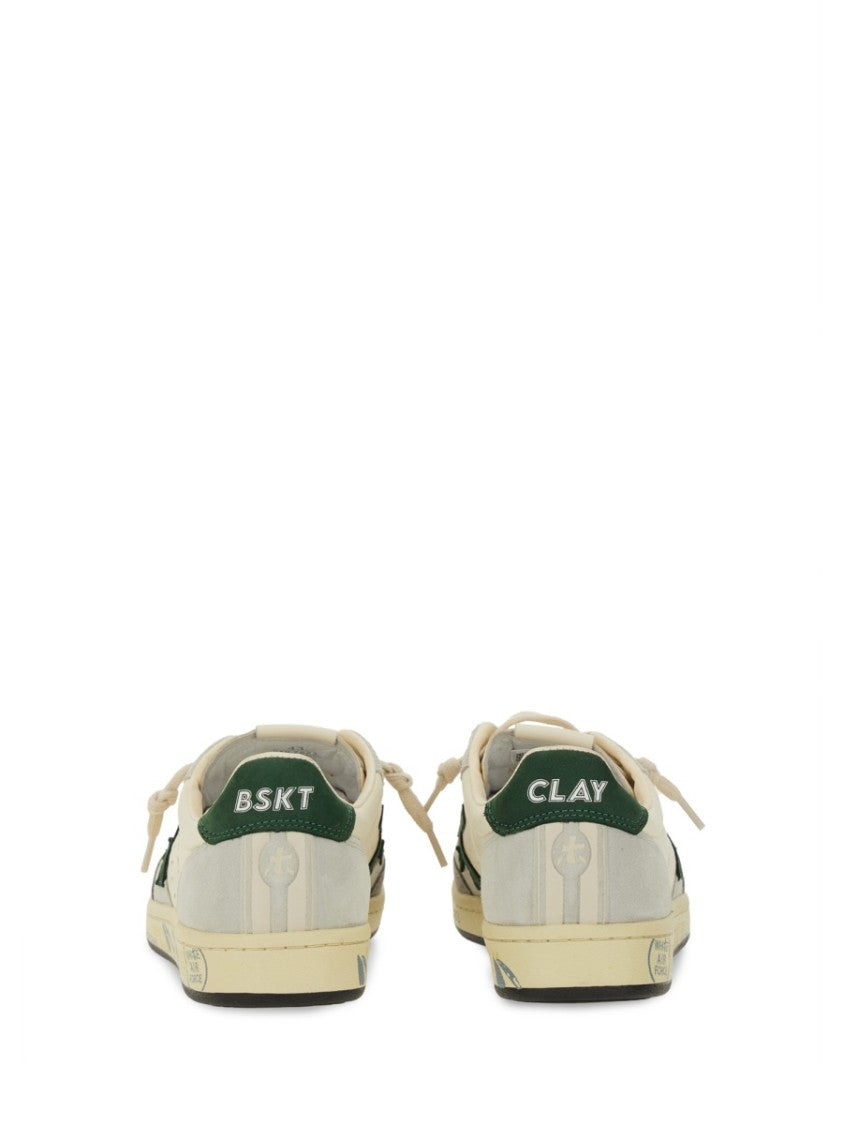 Premiata Low-Top Sneakers With Perforated Detailing And Distinctive Logo