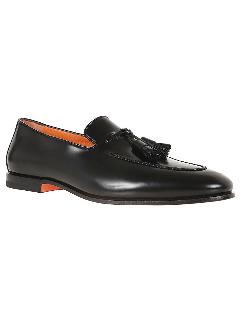 Santoni Black Leather Moccasin With Tapered Toe And Decorative Tassels