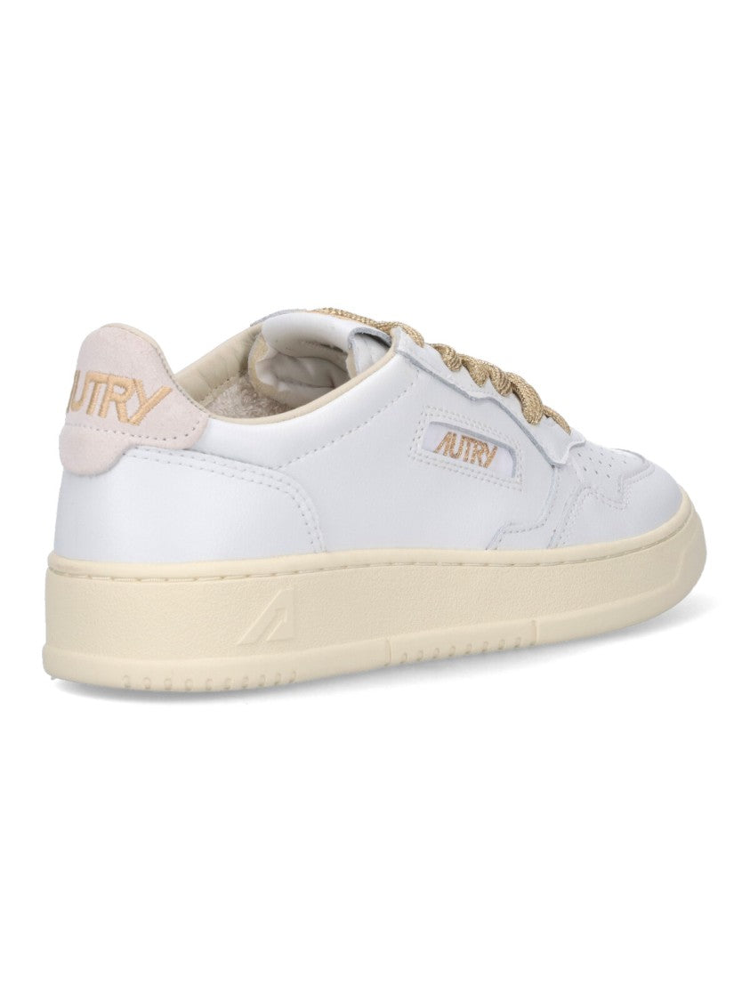 Autry Low-Top Sneakers With Suede Accents And Golden Details