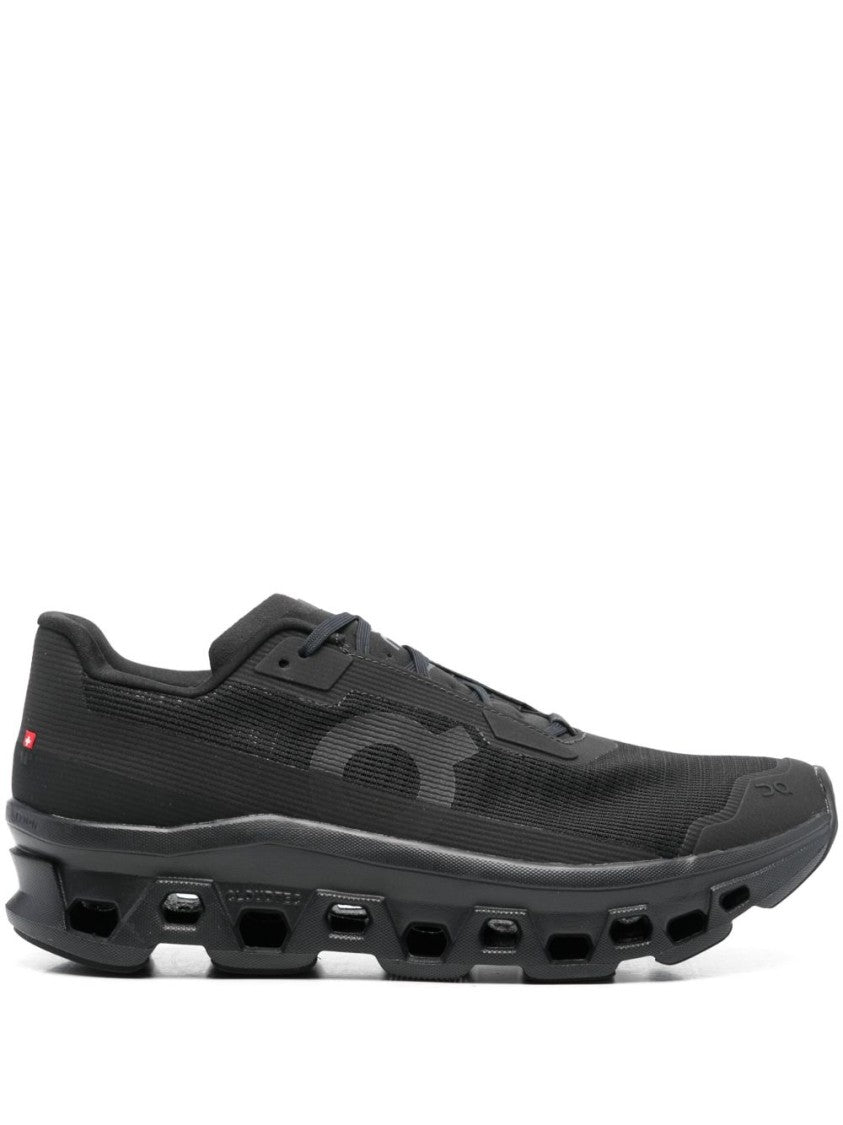 On All-Black On Sneakers With Hexagonal Cushioning Design