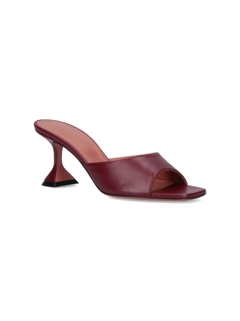 Amina Muaddi Sleek Pumps With Bold Red Heel And Contemporary Design