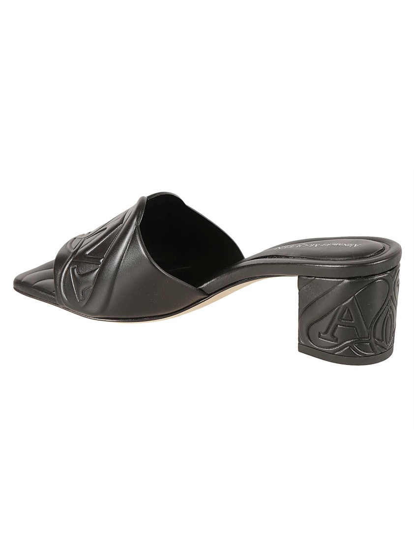 Alexander Mcqueen Black Heeled Mules With Embossed Detailing