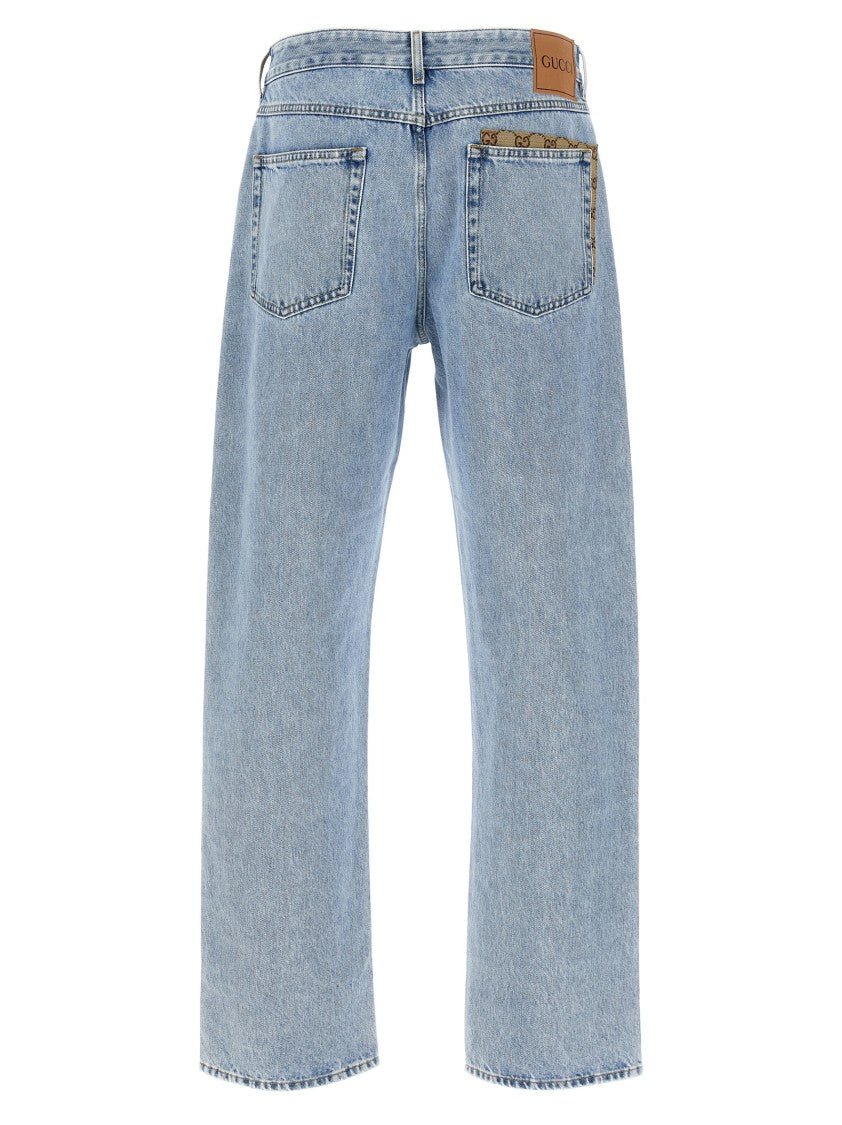 Gucci Bleached-Effect Denim Jeans With Signature Gg Inserts