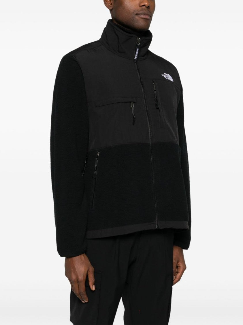 The North Face Textured Black Mid-Layer Jacket With Zip Pockets And Stand-Up Collar