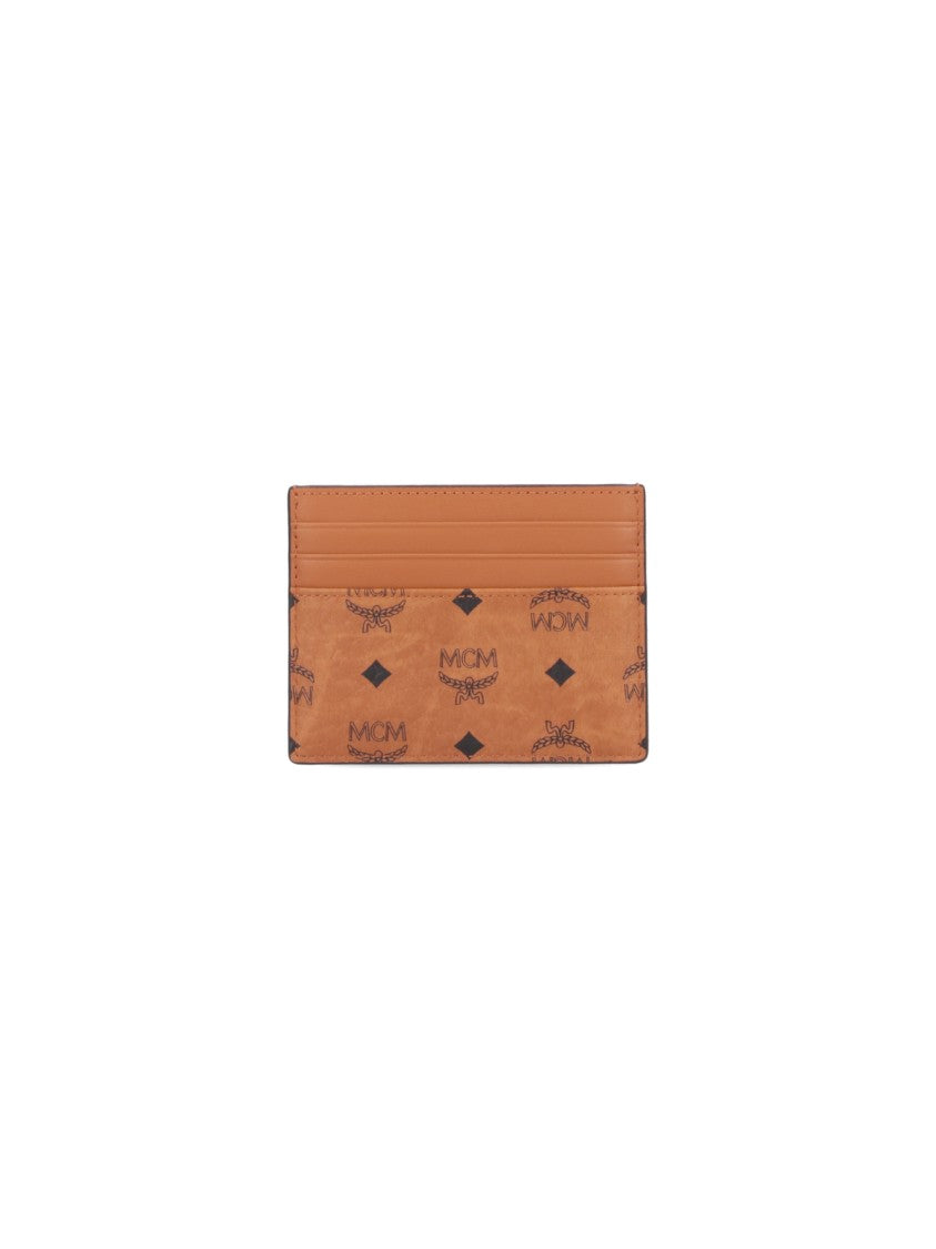 Mcm Brown Wallet With Embossed Pattern