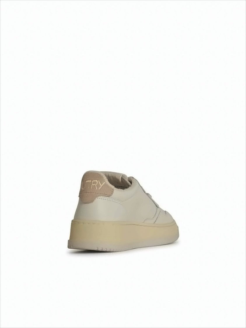 Autry Minimalist Low-Top Sneakers With Perforated Detailing