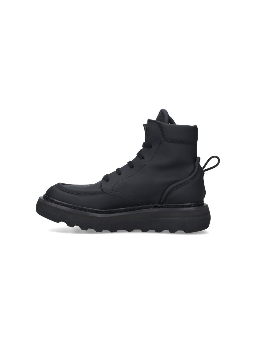 Premiata "Cal 32130" Ankle Boots In Black Rubberized Fabric