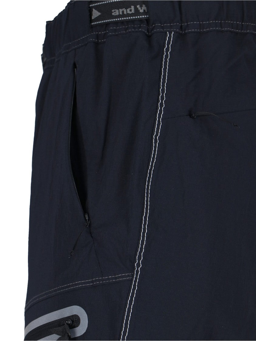 And Wander Streamlined Black Trousers With Zippered Pockets