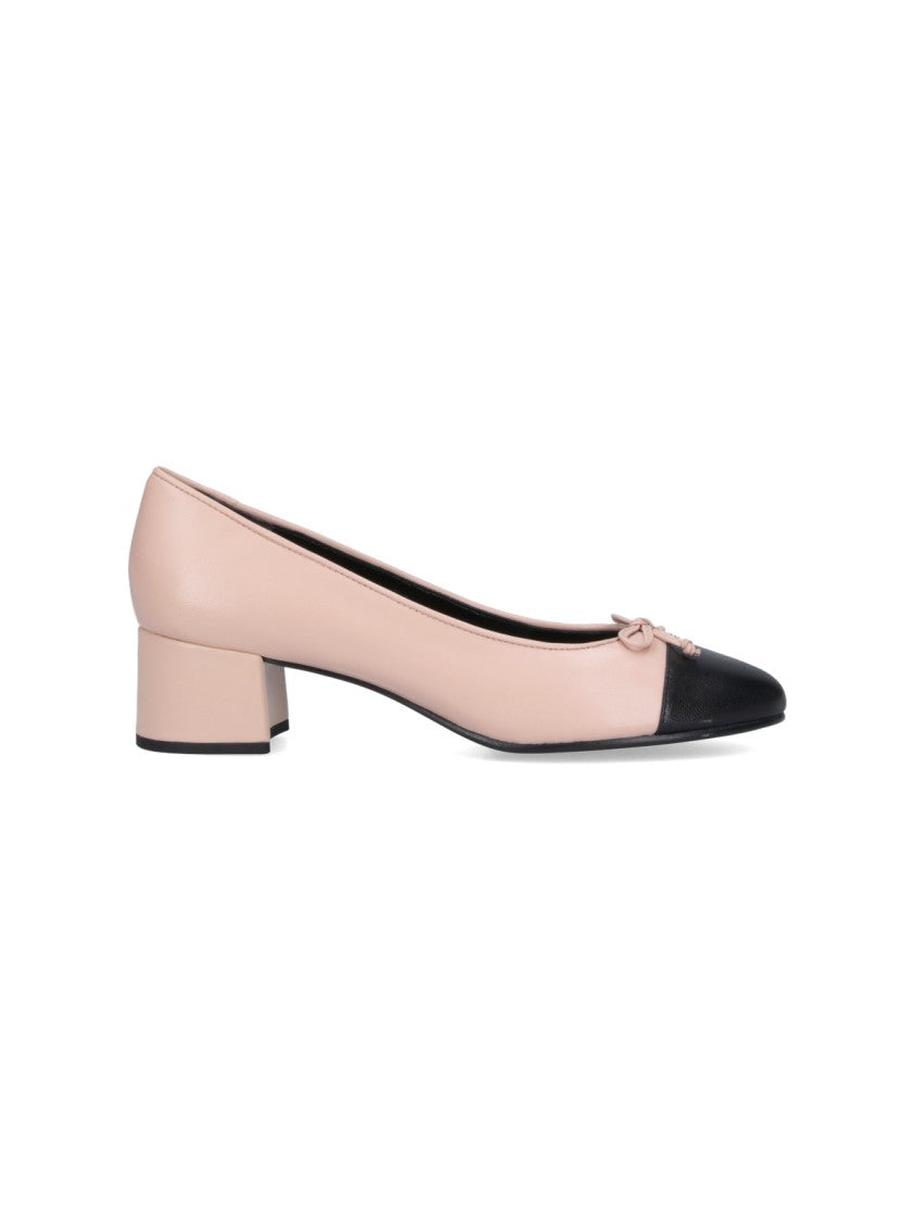 Tory Burch Pink Hammered Leather Bow Pumps