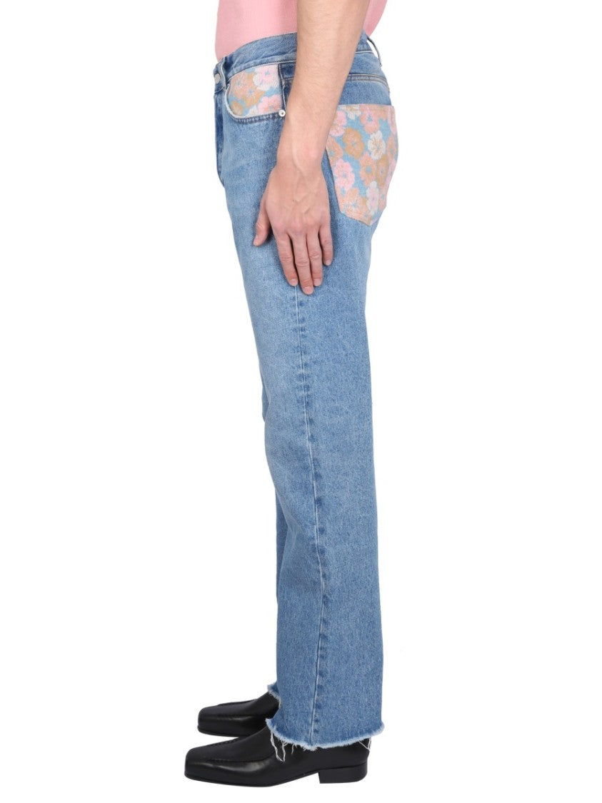 Séfr Light-Wash Jeans With Distressed Hem