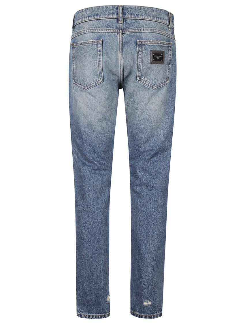 Dolce & Gabbana Distressed Blue Jeans With Vintage Faded Wash