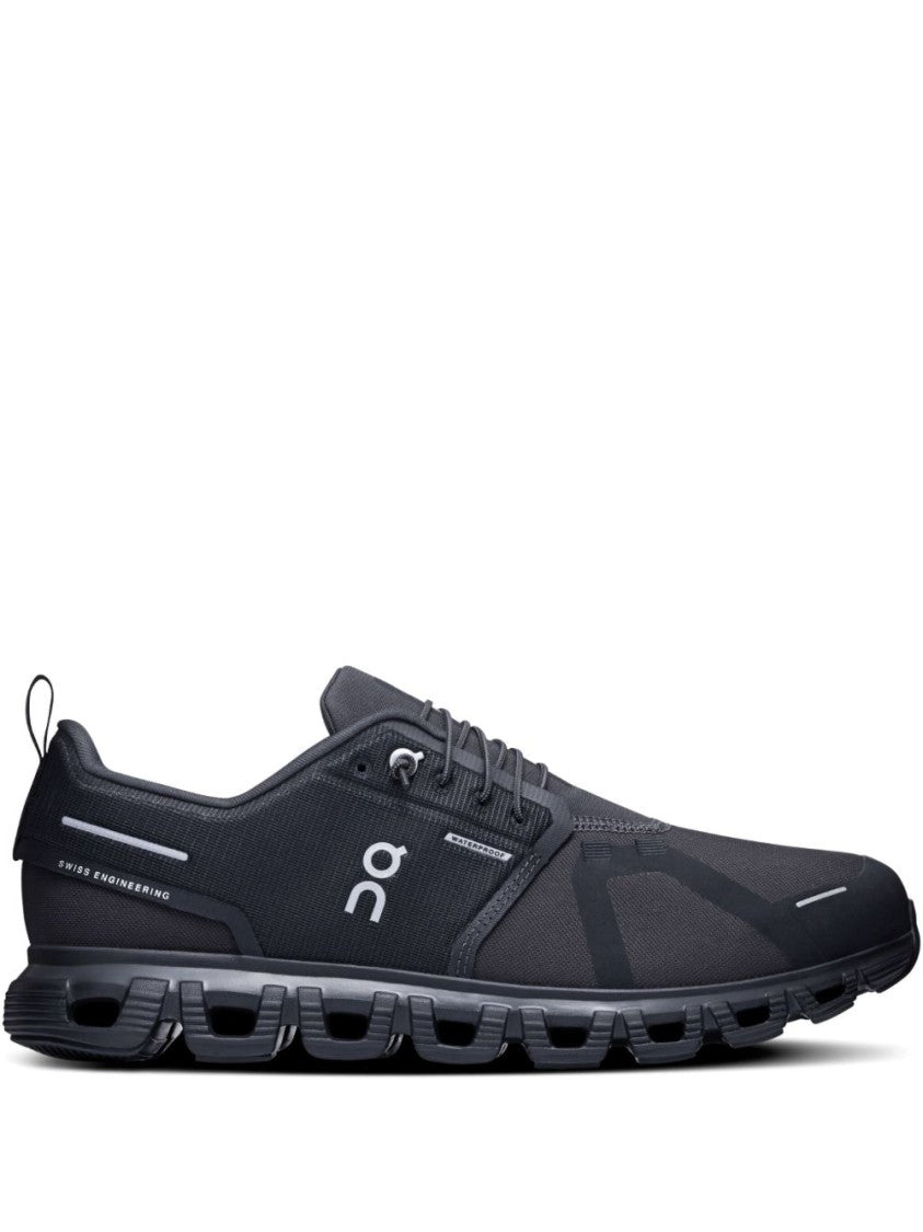 On Low-Profile Black Sneakers With Reflective Accents