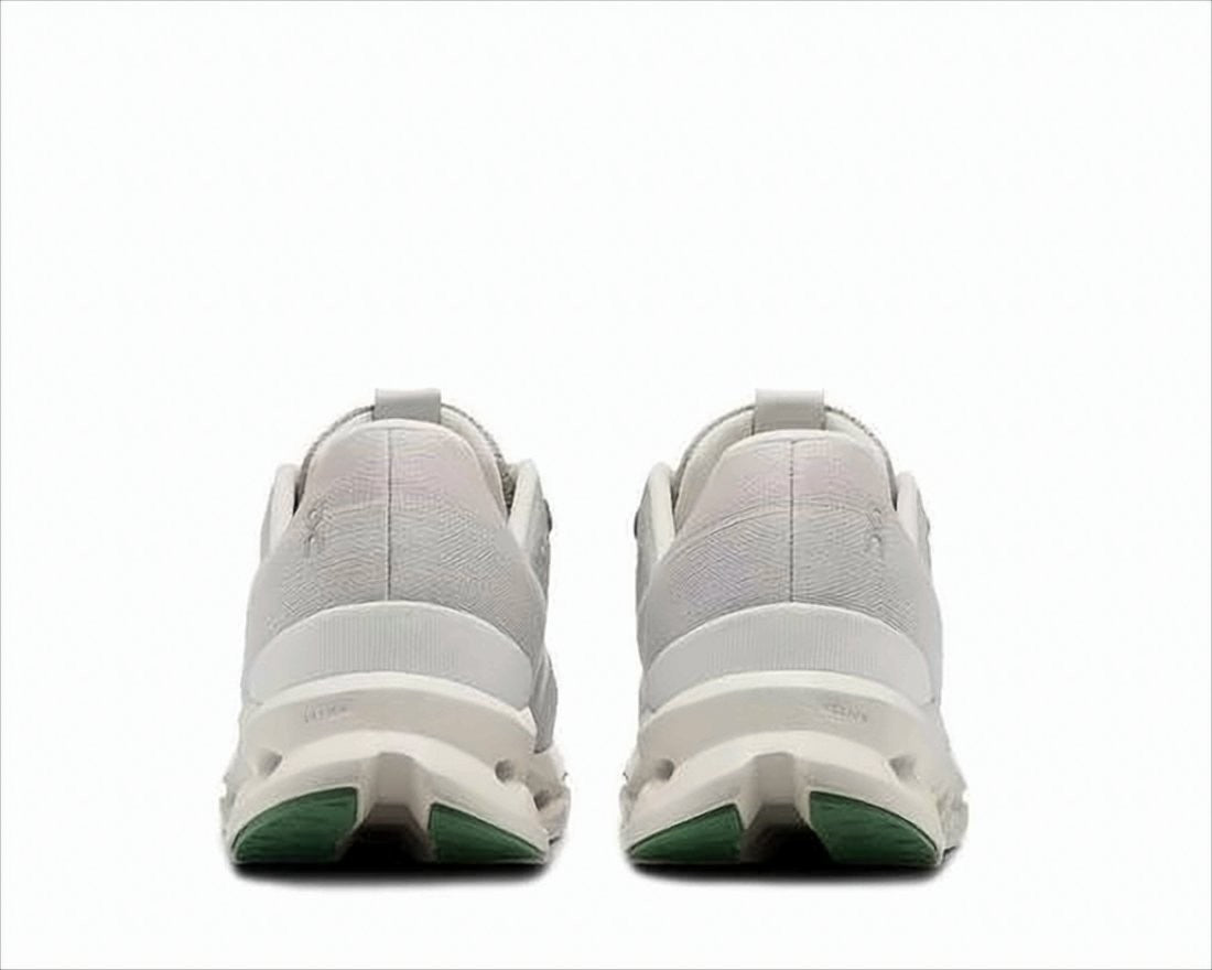 On Running Sleek White Sneakers With Breathable Mesh Upper And Cushioned Sole