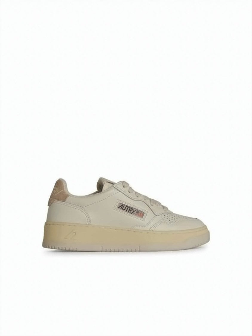 Autry Minimalist Low-Top Sneakers With Perforated Detailing