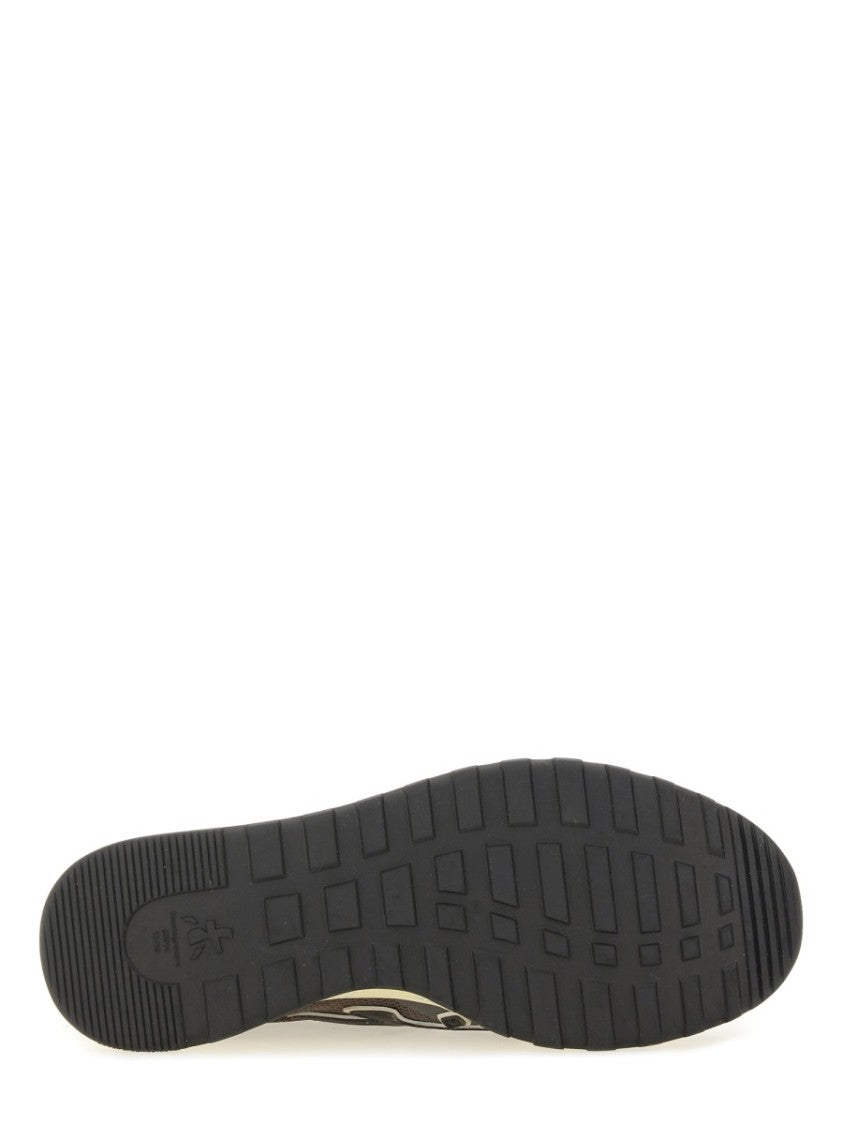 Premiata Layered Brown Sneakers With Textured Accents And Cream Sole