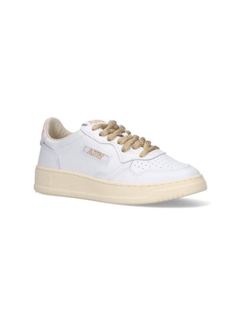 Autry Low-Top Sneakers With Suede Accents And Golden Details