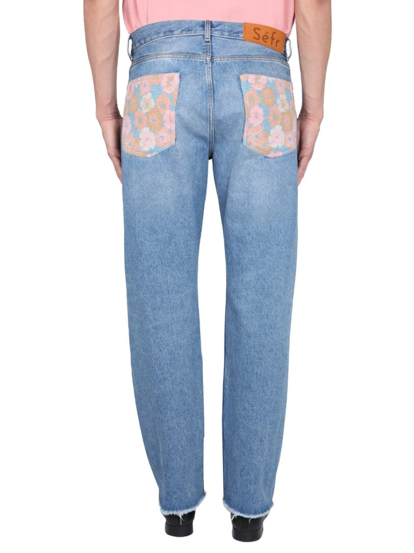 Séfr Light-Wash Jeans With Distressed Hem