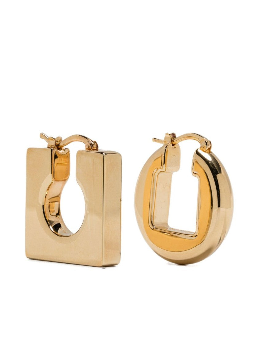 Jacquemus Asymmetrical Hoop Earrings In Polished Brass