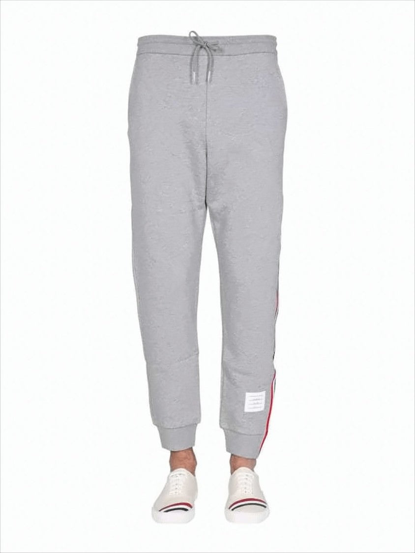 Thom Browne Slim Fit Jogger Pants With Tricolor Side Stripes