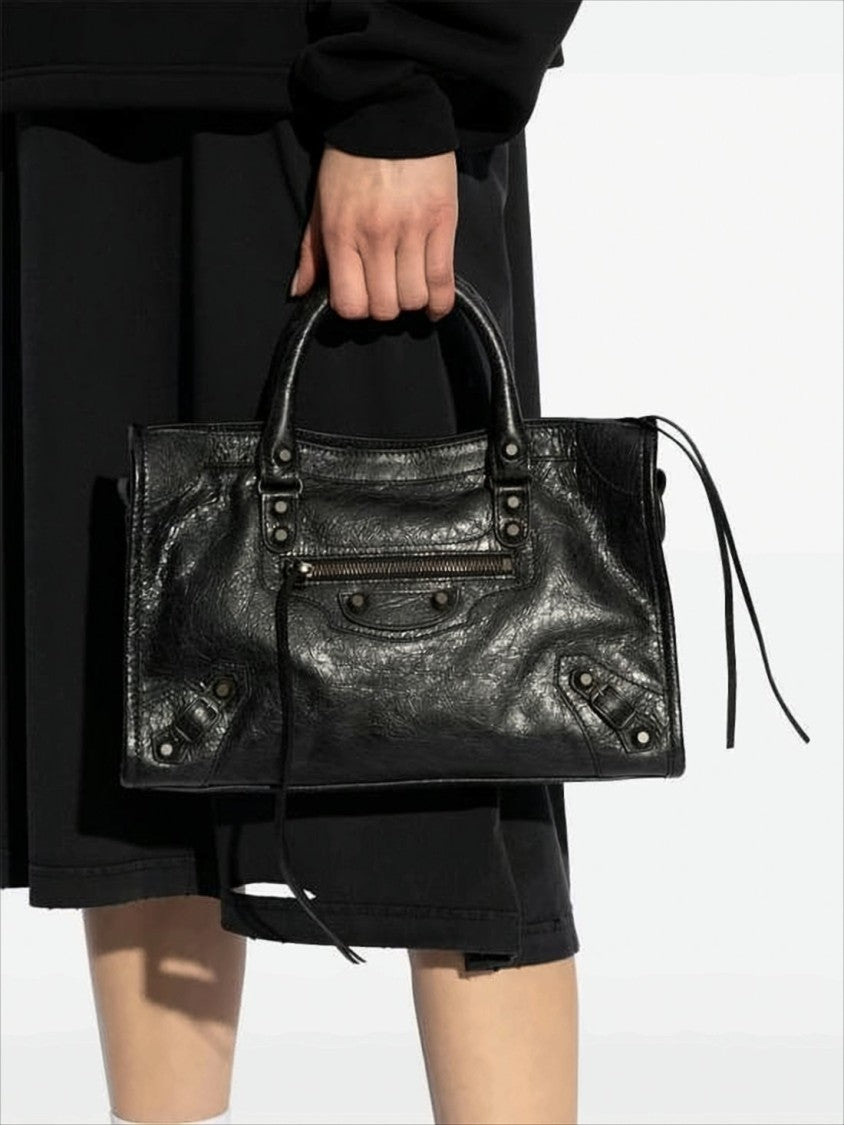 Balenciaga Textured Leather Shoulder Bag With Adjustable Strap And Edgy Accents