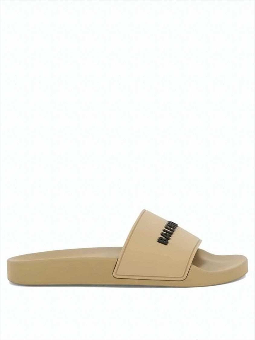 Balenciaga Rubber Slip-On Mules With Textured Sole And Raised Lettering