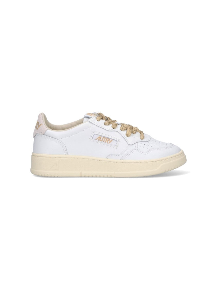 Autry Low-Top Sneakers With Suede Accents And Golden Details