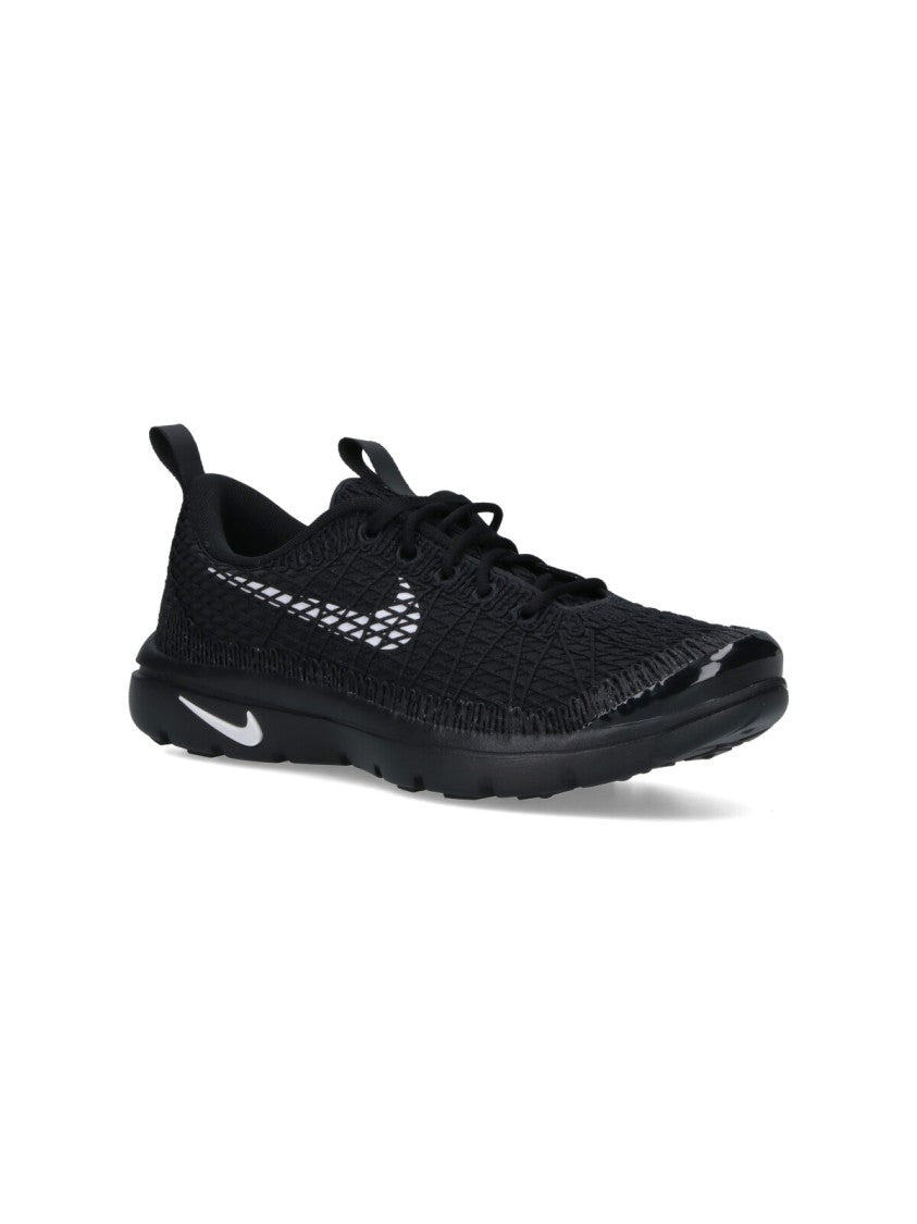 Comme Des Garçons Textured Black Sneakers With Low-Profile Design And Distinctive Branding