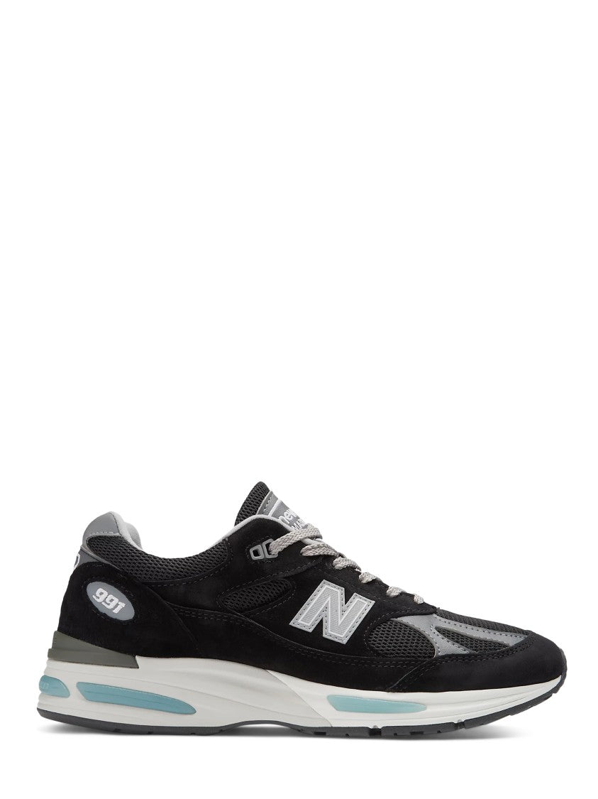 New Balance Mesh And Suede Black Sneakers With Light Blue Accents