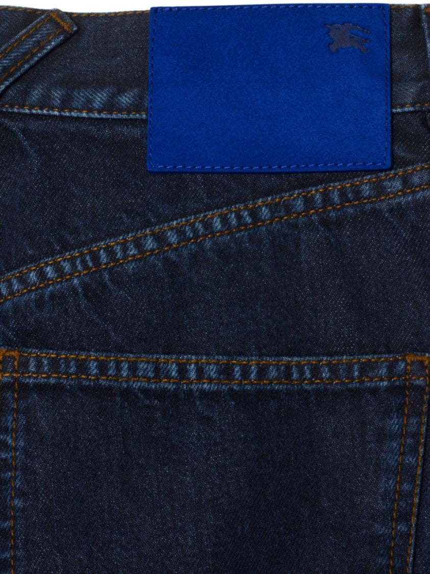 Burberry Flared Dark Wash Denim Trousers With Five-Pocket Styling