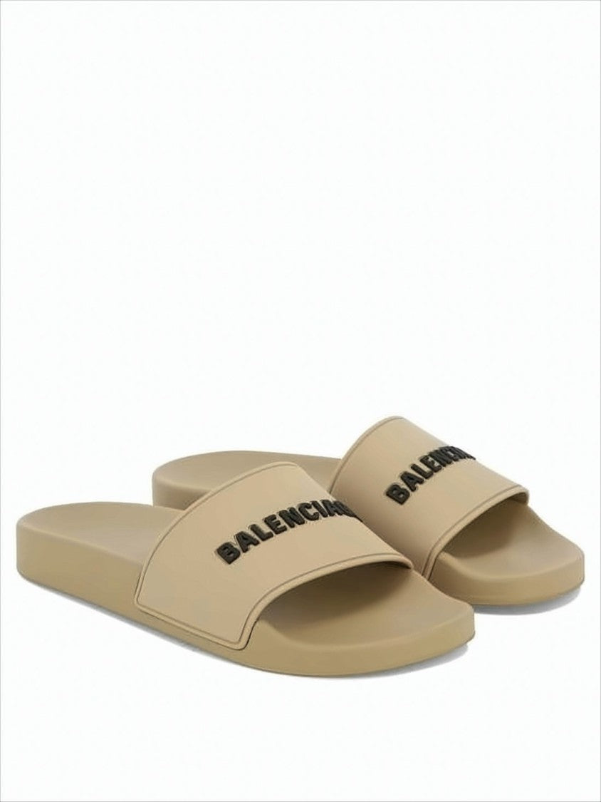 Balenciaga Rubber Slip-On Mules With Textured Sole And Raised Lettering