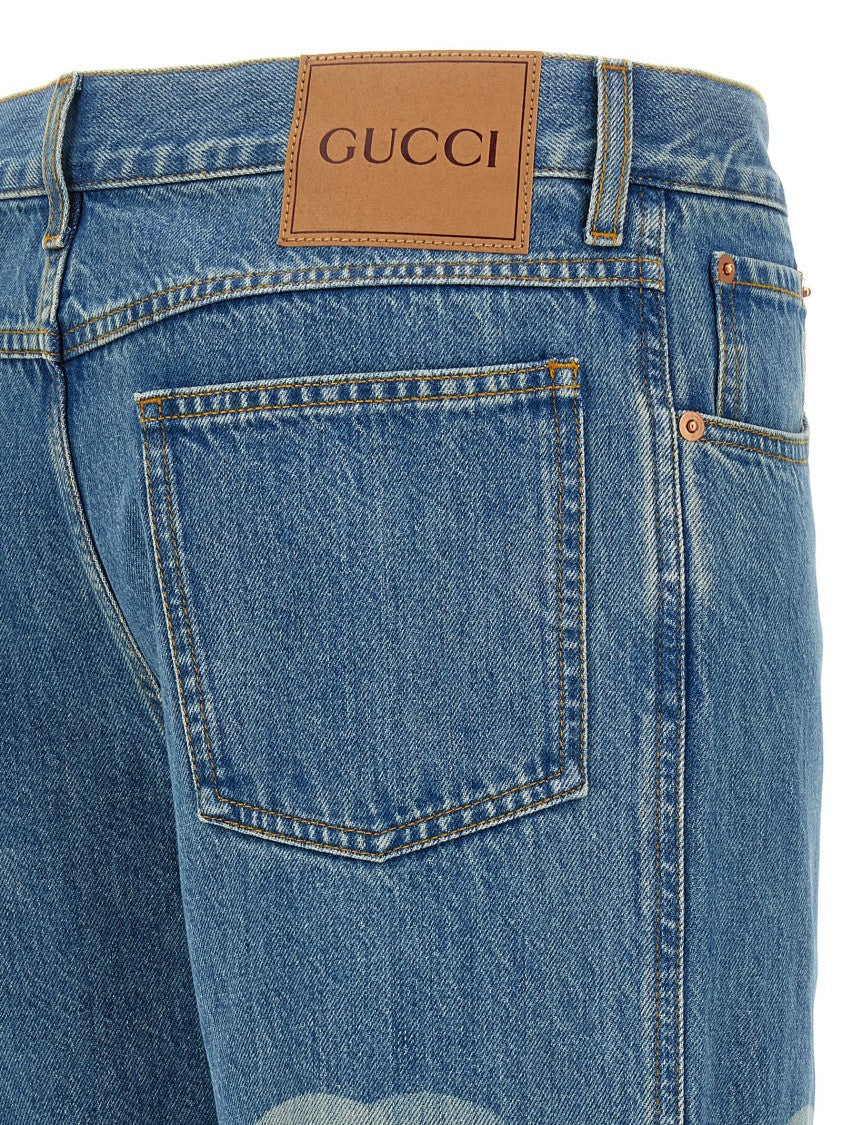 Gucci Cropped Slim Fit Denim Jeans With Laser-Etched Logo