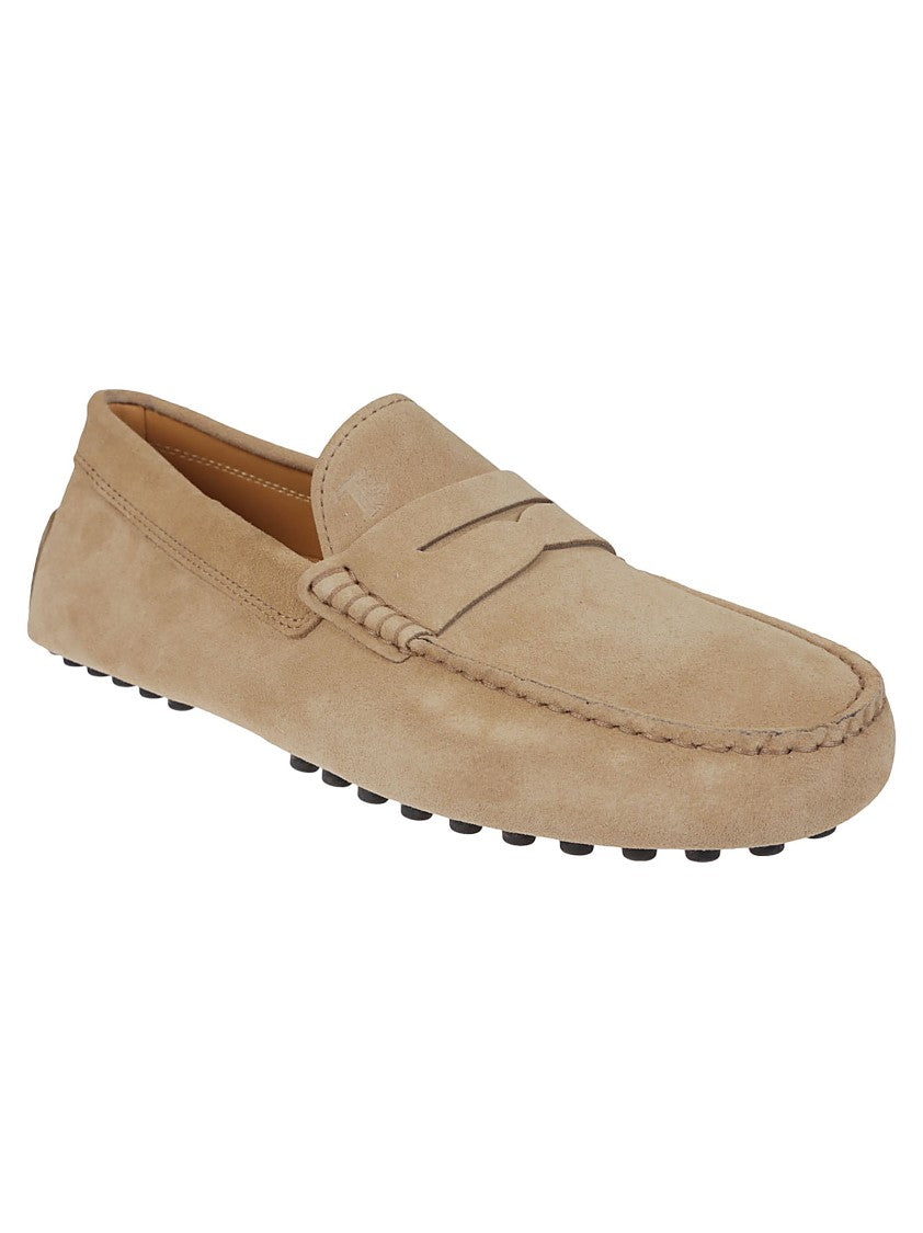 Tod's Moccasin-Inspired Leather Loafers With Rubber Pebble Sole