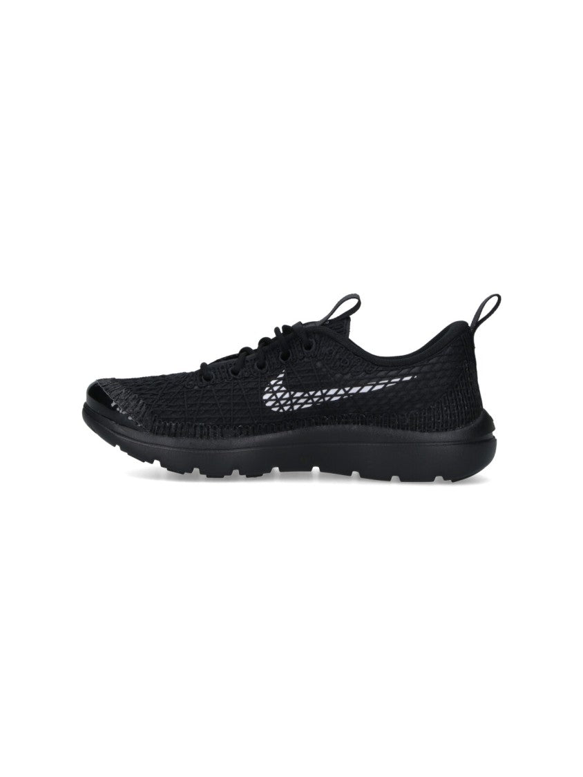 Comme Des Garçons Textured Black Sneakers With Low-Profile Design And Distinctive Branding