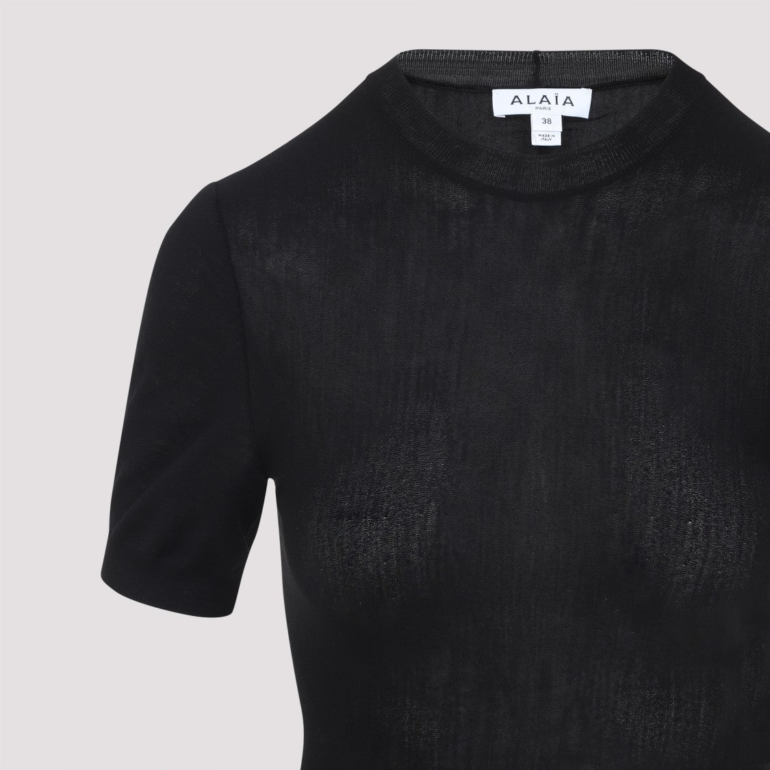 Alaïa Peplum-Style Short-Sleeved Top In Virgin Wool
