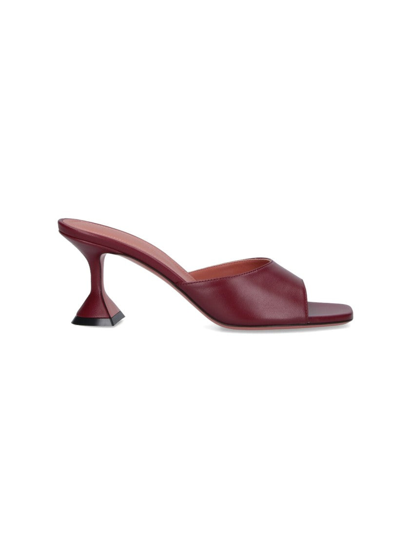Amina Muaddi Sleek Pumps With Bold Red Heel And Contemporary Design